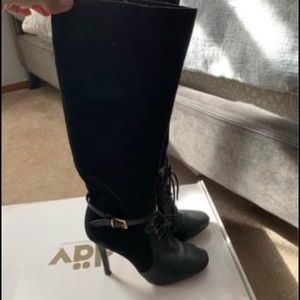 Victoria Secret leather and suede high boots.